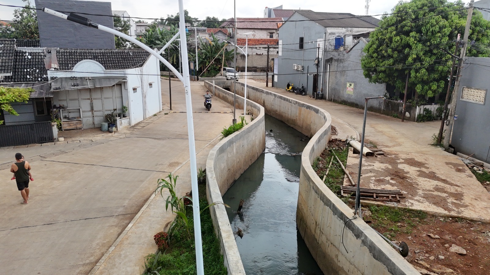 Dinas SDABMBK Tingkatkan Kualitas Jalan dalam Pengendalian Banjir di Tahun 2025 2 Dinas SDABMBK Tingkatkan Kualitas Infrastruktur Jalan dan Pengendalian Banjir
